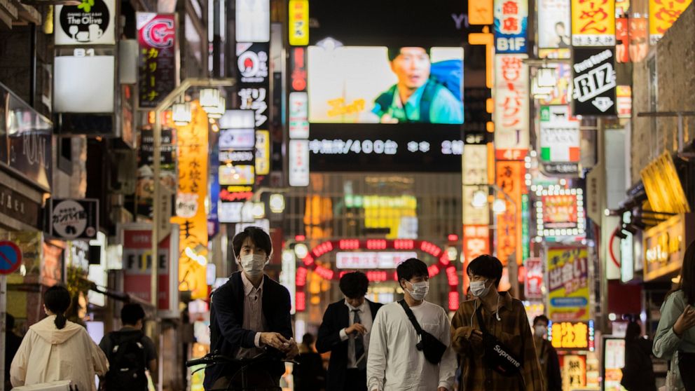 Vaccines, masks? Japan puzzling over sudden virus
success 1