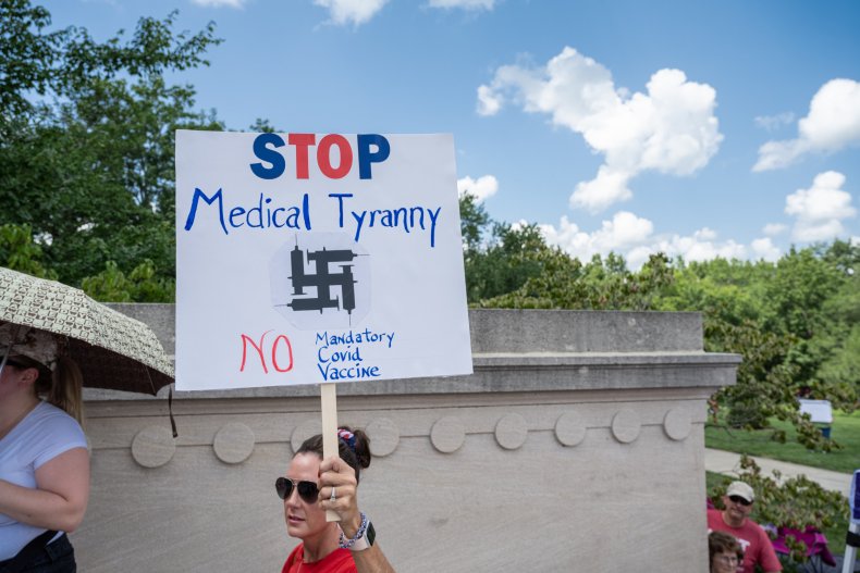TikToker Confronts Group Using Nazi Flag to Protest COVID-19
Vaccine 1