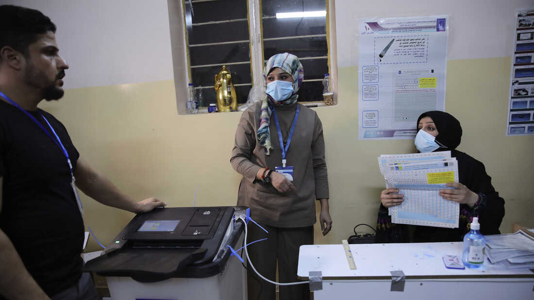 Polls open in Iraq's general elections amid tight
security 1