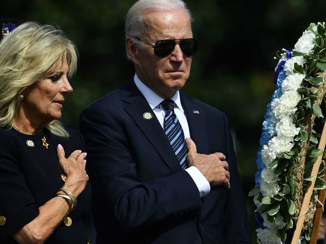 At a memorial ceremony for officers, Biden renews calls for
police reform 1