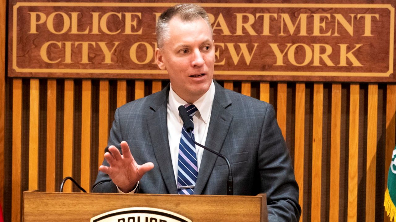Three NYPD officers charged with bribery, feds say 1
