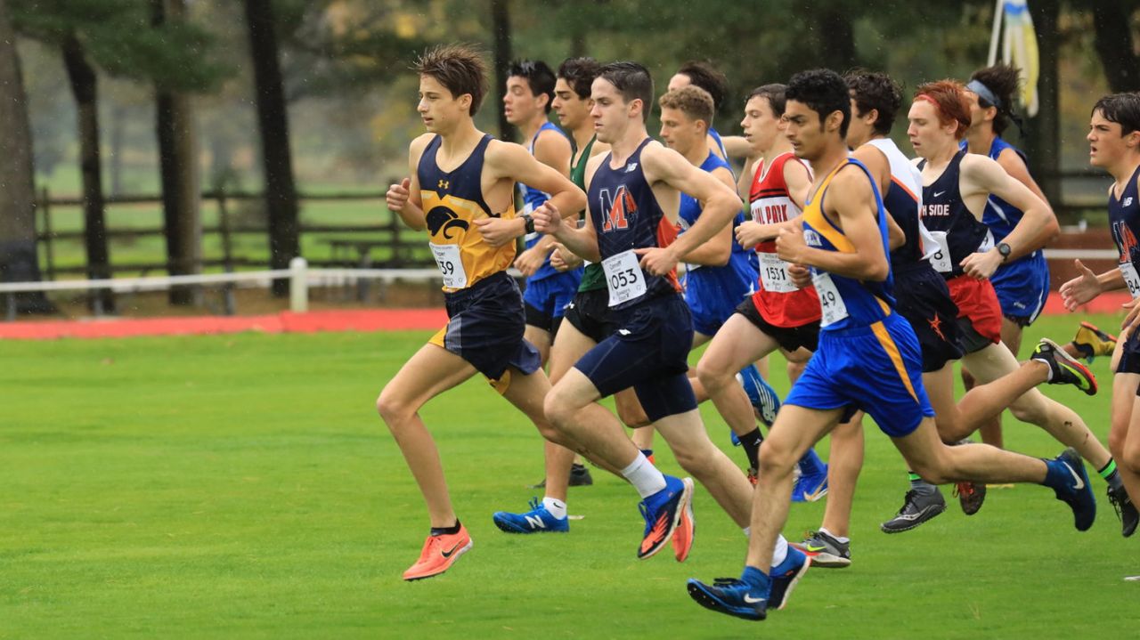Jericho's Alex Kasper overcomes messy course to win Nassau
Class II cross country crown 1