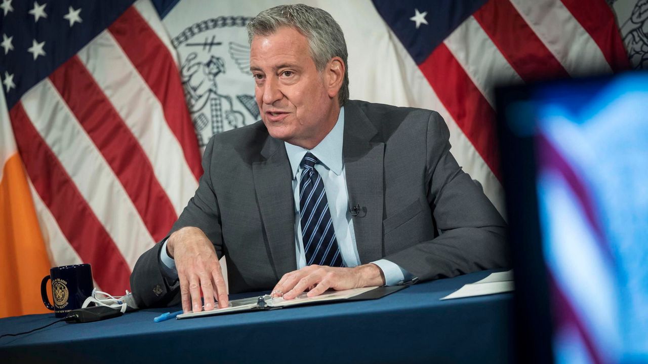 De Blasio: Unvaccinated personnel officially barred
from NYC public schools 1