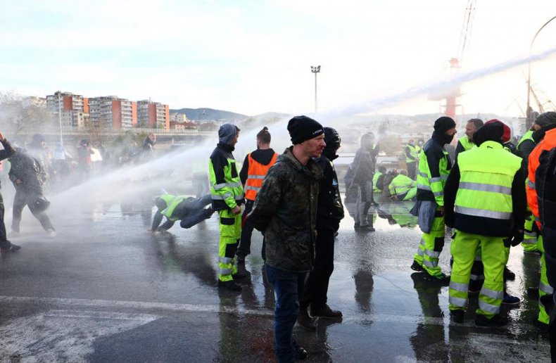 Italy's President Calls Violent Protests Over COVID-19
Passes 'Painful' for Nation 1
