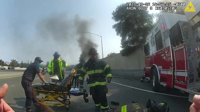 'His Shoes Were Melted to the Floorboard': Police Officer
Rescues Man From Burning Car 1