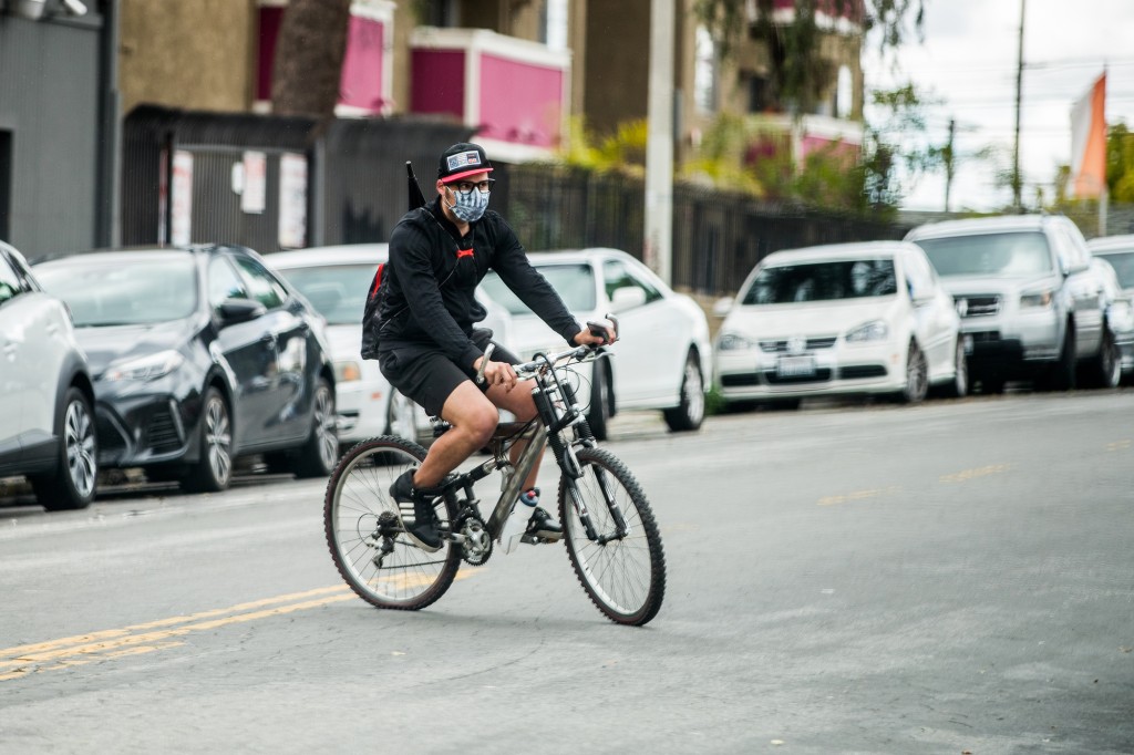 Bike riders wearing masks — but not helmets — a metaphor for
our unscientific times 1