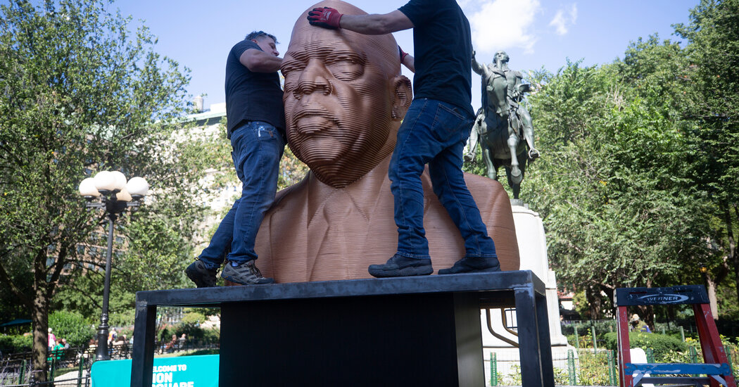 George Floyd, Breonna Taylor and John Lewis Statues Go Up in
N.Y. 1 George Floyd, Breonna Taylor and John Lewis Statues Go Up in
N.Y. 1