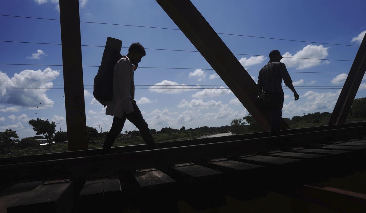 Activists complain of COVID-19 spread from illegal
immigrants pushed back across border 1