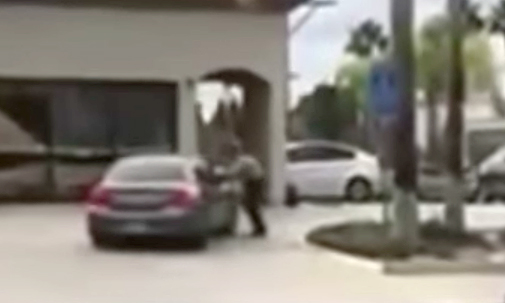 Long Beach school security officer fired after killing
18-year-old 1