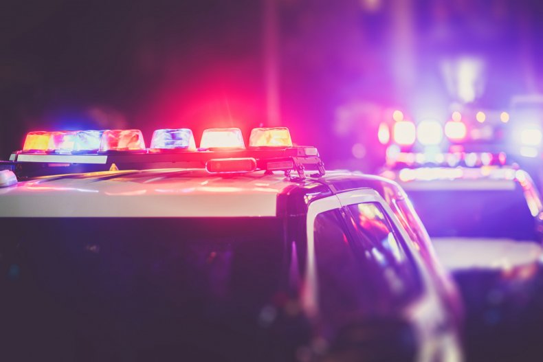 Woman Wakes up to Find Man in Ski Mask at Foot of Her
Bed 1