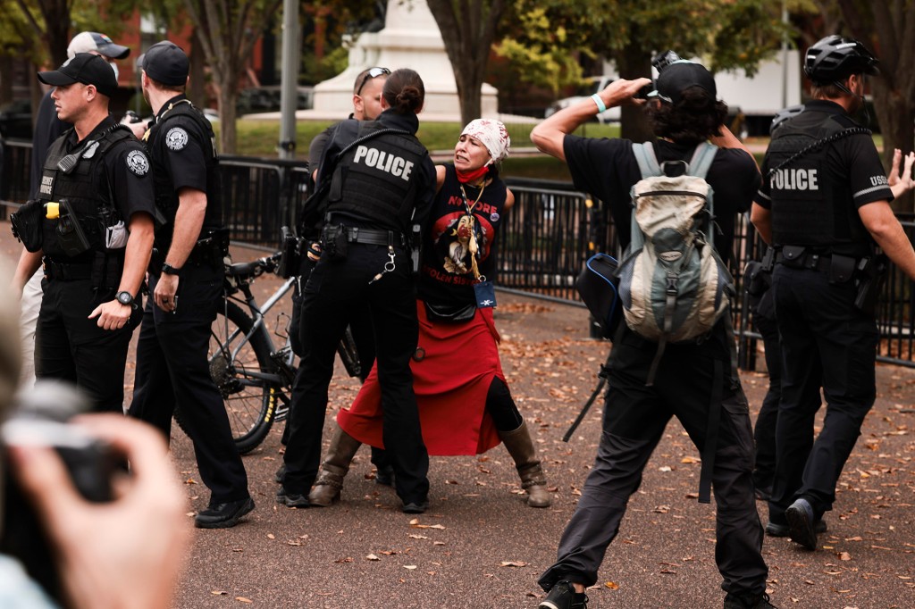 At least one arrest as climate activists protest outside
White House on Indigenous Peoples’ Day 1