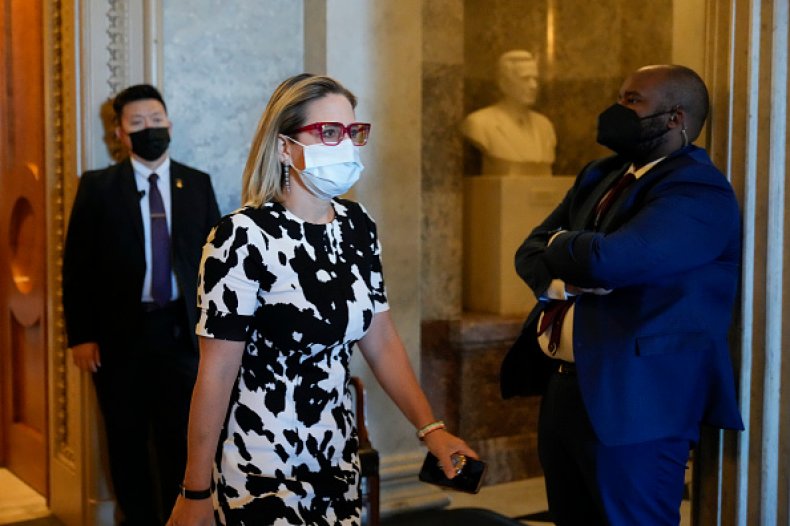 Kyrsten Sinema, Under Siege From Left, Faces Protests,
Primary Challenge, SNL Scorn 1