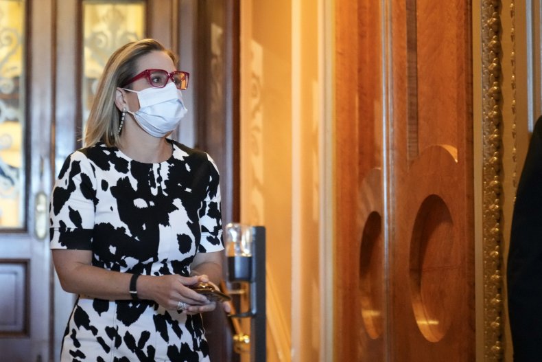 Kyrsten Sinema Issues Fiery Response to Protesters Who
Followed Her to Bathroom 1