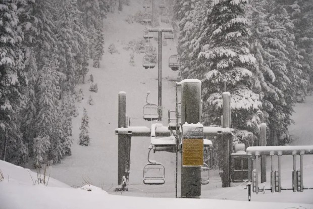 2 feet of snow in Sierra; record rain in Reno; I-80
reopens 1