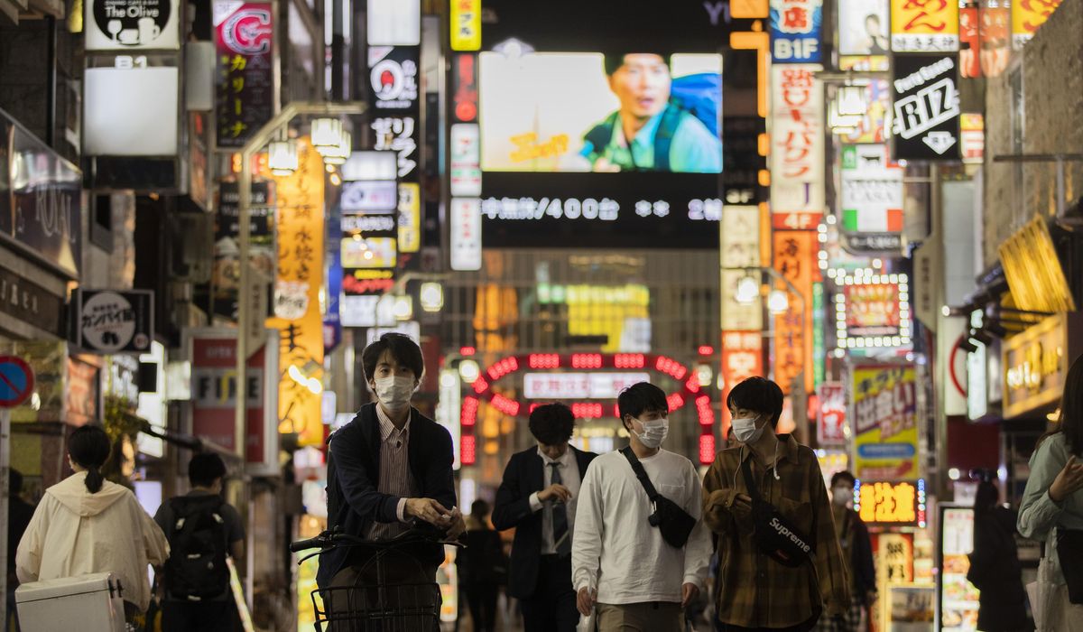 Vaccines, masks? Japan puzzling over sudden virus
success 1