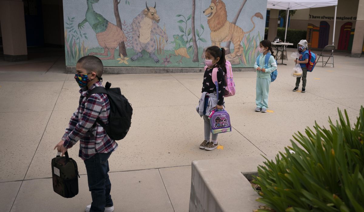 Catholic group urges COVID-weary parents to flee public
schools 1