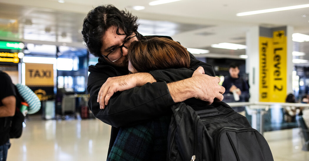 Airports Are Scenes of Joyous Reunions as U.S.
Reopens 1