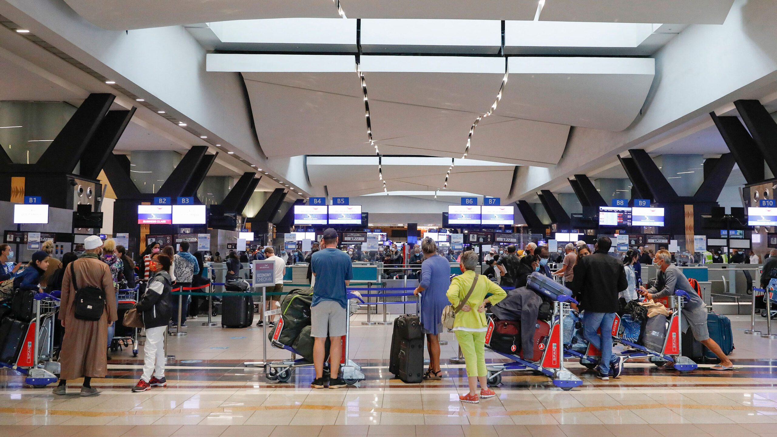 The US and other major destinations are blocking flights
from several African countries after the discovery of a new,
potentially more transmissible variant of Covid-19 1