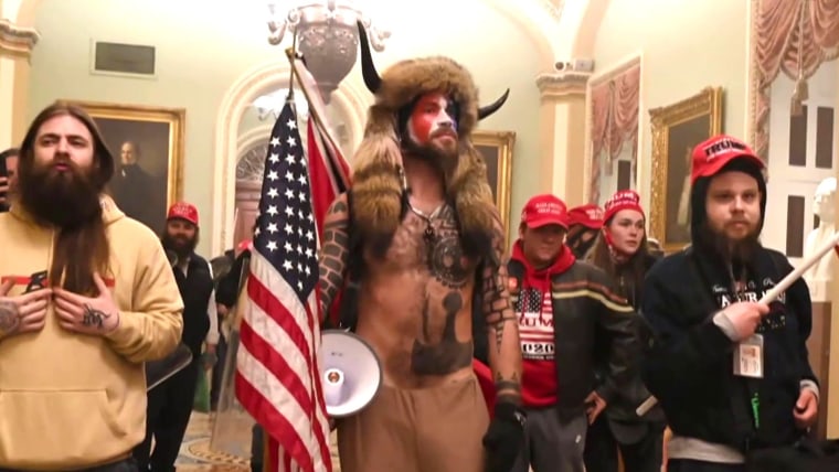 Man seen carrying speaker's lectern at Jan. 6 riot pleads
guilty 1