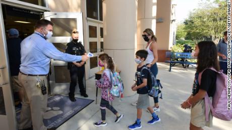 Florida Department of Education releases paychecks it
withheld from school board members that implemented mask
mandates 1