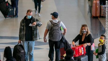 Analysis: On the move again, Americans try to look past
Covid-19 for Thanksgiving 1