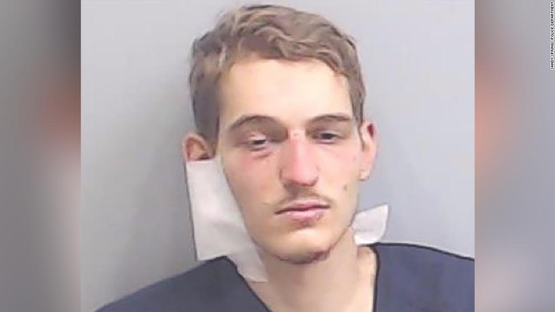 Atlanta-area man accused of killing a couple in their home
and stabbing a police officer 1