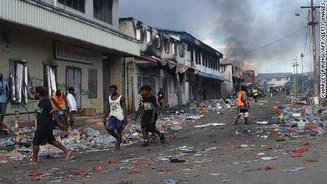 3 burned bodies found in Solomon Islands' Chinatown after
days of violent protests 1