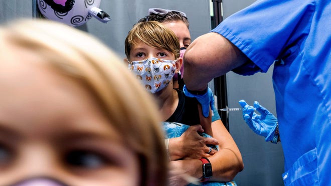 'Closer to ending the pandemic': California, Michigan begin
vaccinating young children: COVID-19 updates 1