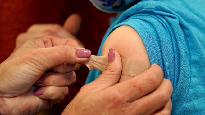COVID-19 has taken heavy toll on women's workforce;
intelligence officers refusing vaccine worries lawmakers: Latest
updates 1