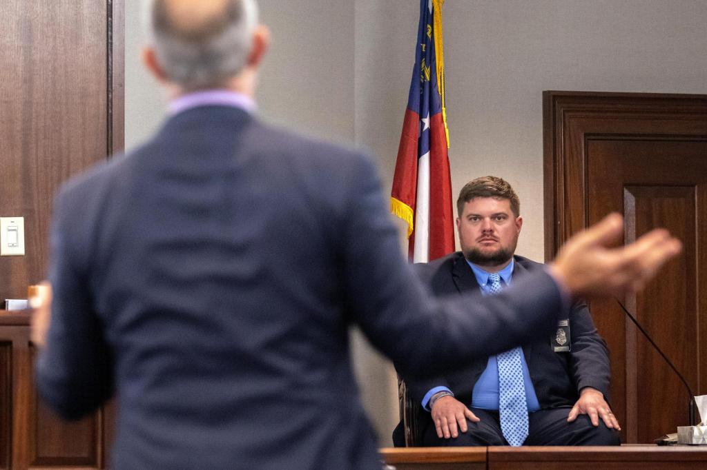 Georgia police officer testifies Ahmaud Arbery would have
received a trespass warning 1