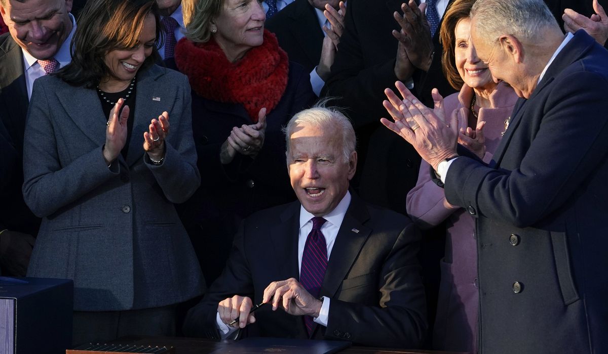 Biden signs $1.2T infrastructure bill into law, opening up
funds for roads, ports 1