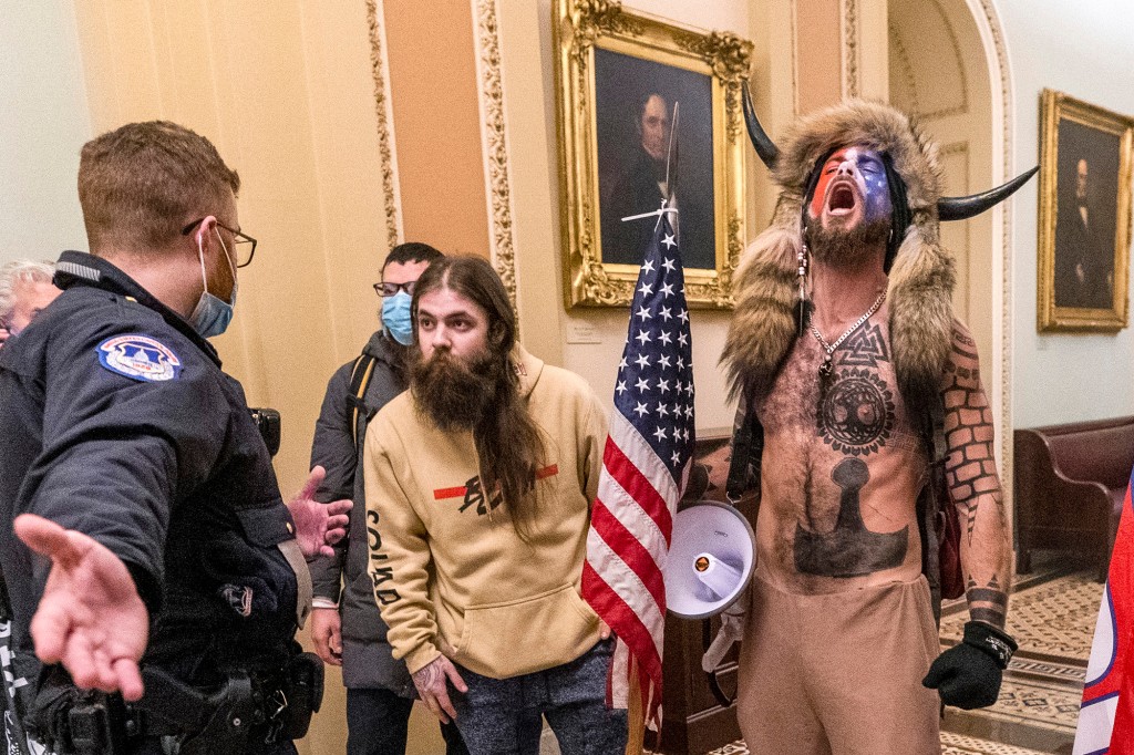 ‘QAnon Shaman’ gets more than three years in jail for role
in Capitol riot 1