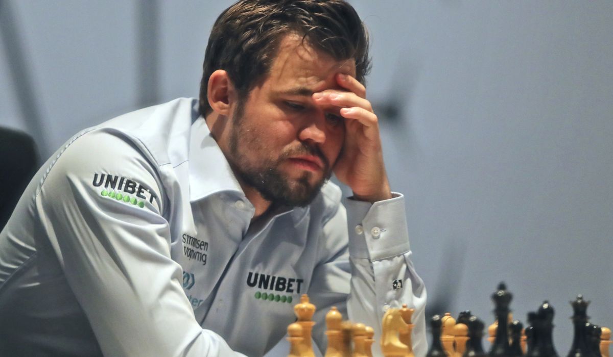 Seesaw battle leads to second draw to open world chess title
match 1