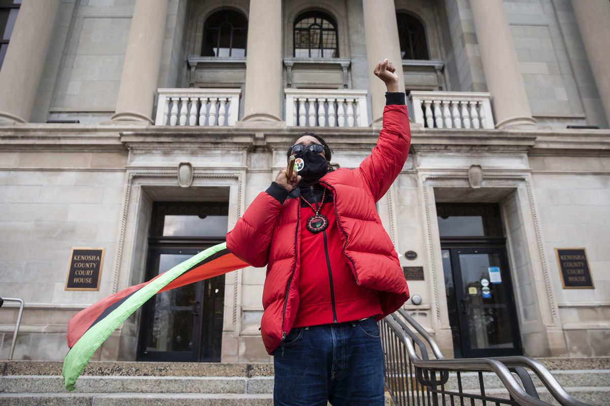 The uncle of Jacob Blake adds his voice to the protests
outside Kenosha courthouse: ‘We got to stand up. What is America
going to look like?’ 1