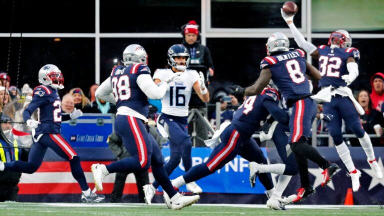 In a matchup of talented, well-coached teams, Patriots wore
down banged-up Titans 1