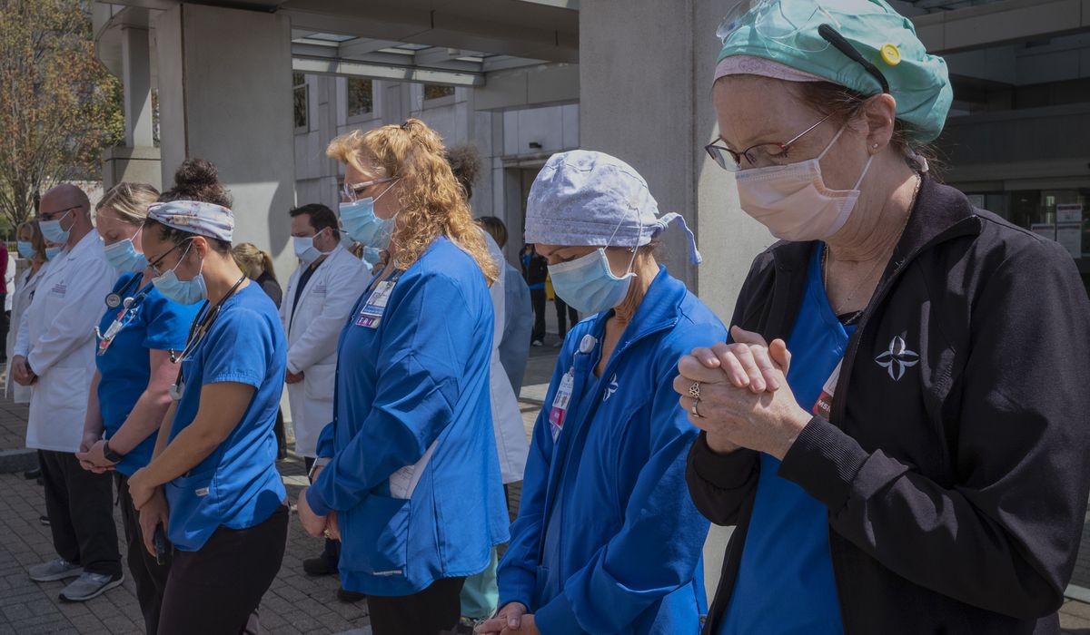 Judge halts Biden admin COVID-19 vaccine mandate for health
workers 1