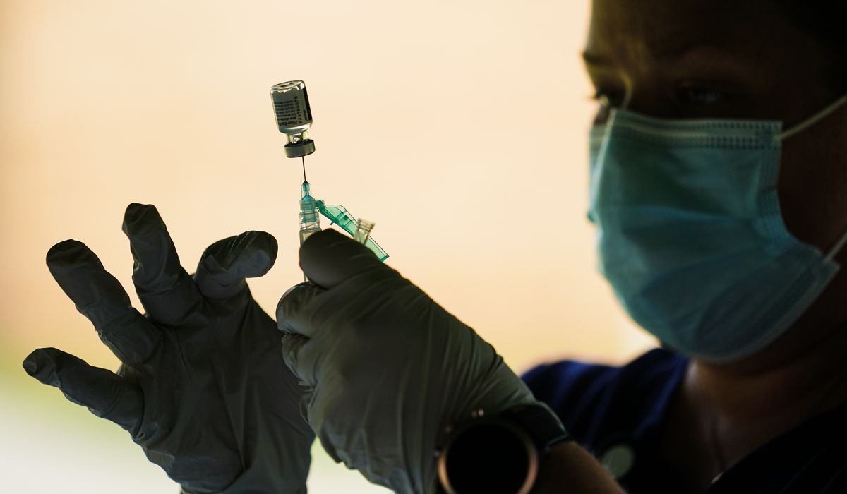 Biden COVID-19 vaccine mandate unprecedented, legal scholars
say 1