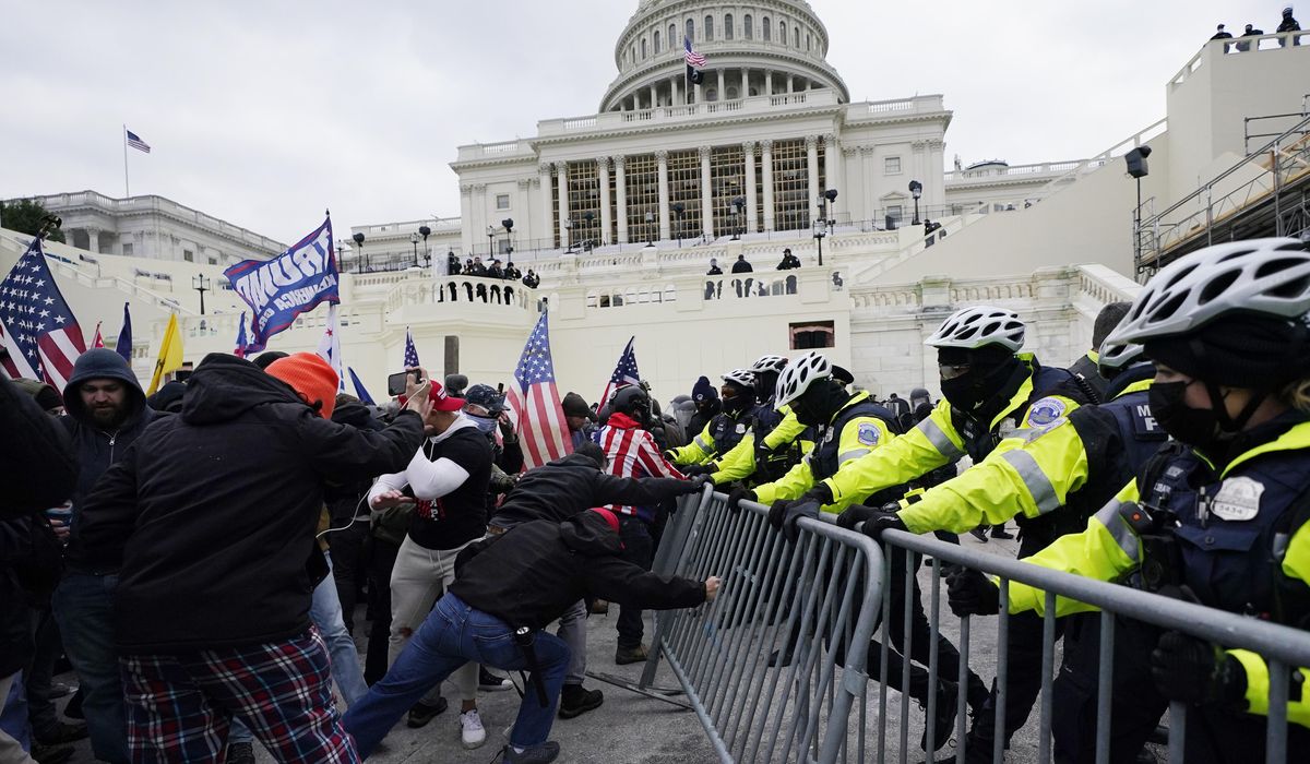 Belarus TV: American facing Jan. 6 riot charges seeks
asylum 1