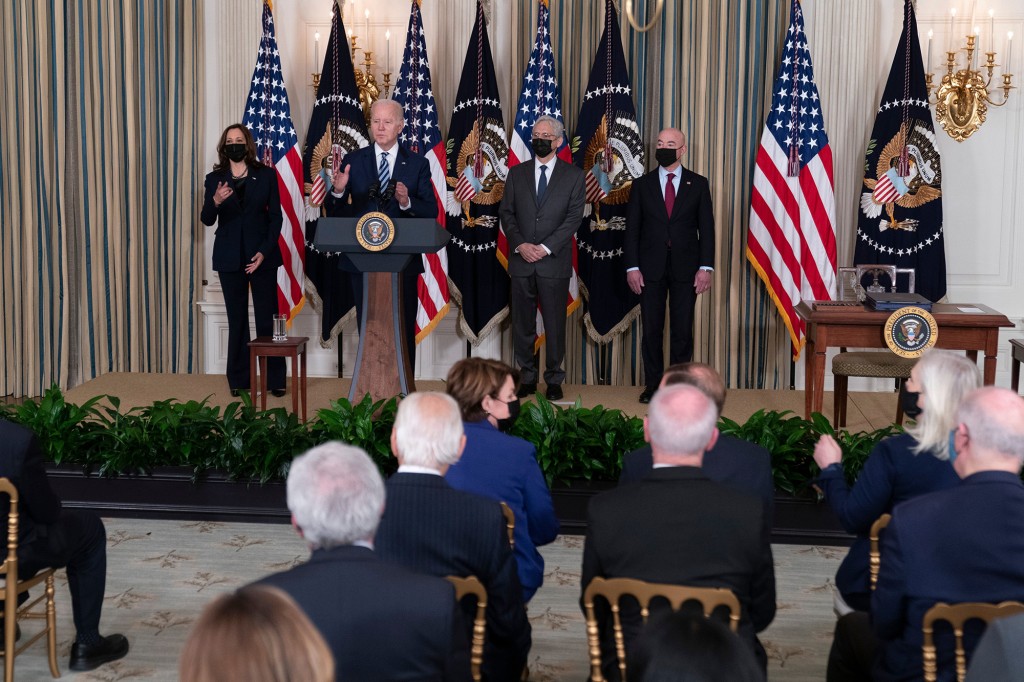 Biden signs three bills supporting first responders, gives
pen to fallen officer’s son 1