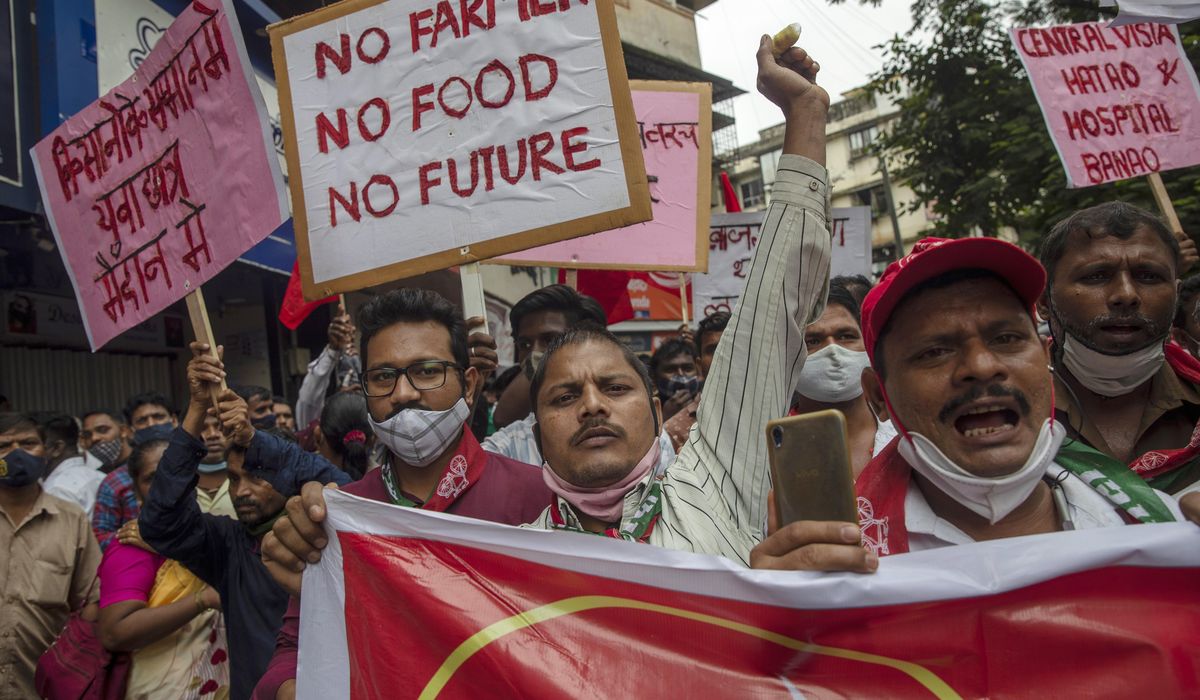 Modi vows to repeal India farm laws after prolonged
protests 1