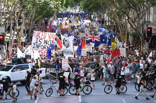 Thousands Protest in Australia Over Virus
Restrictions 1