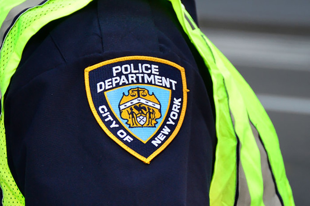 Off-duty NYPD cop opened fire during fight at karaoke
bar 1