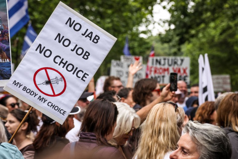 Viral Video of Bride Being Escorted Through Anti-Vaccination
Protest Sparks Debate 1