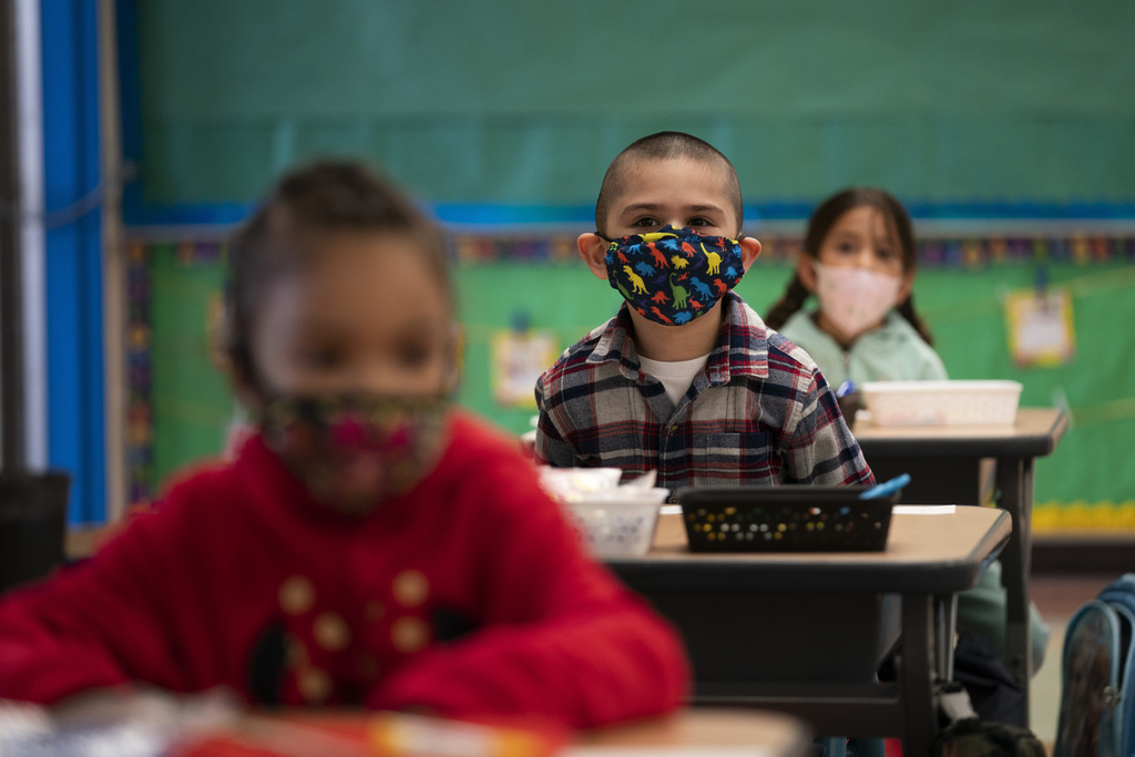 Mask wearing cuts Covid-19 risk in half, new study
shows 1