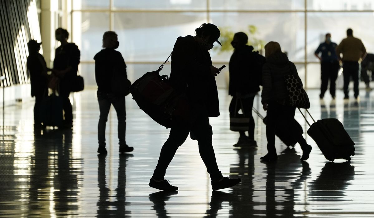 U.S. ends COVID-19 travel bans for vaccinated visitors;
families reunite, airlines celebrate 1