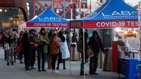How long should you isolate if you're fully vaccinated but
have Covid-19? There is some debate 1