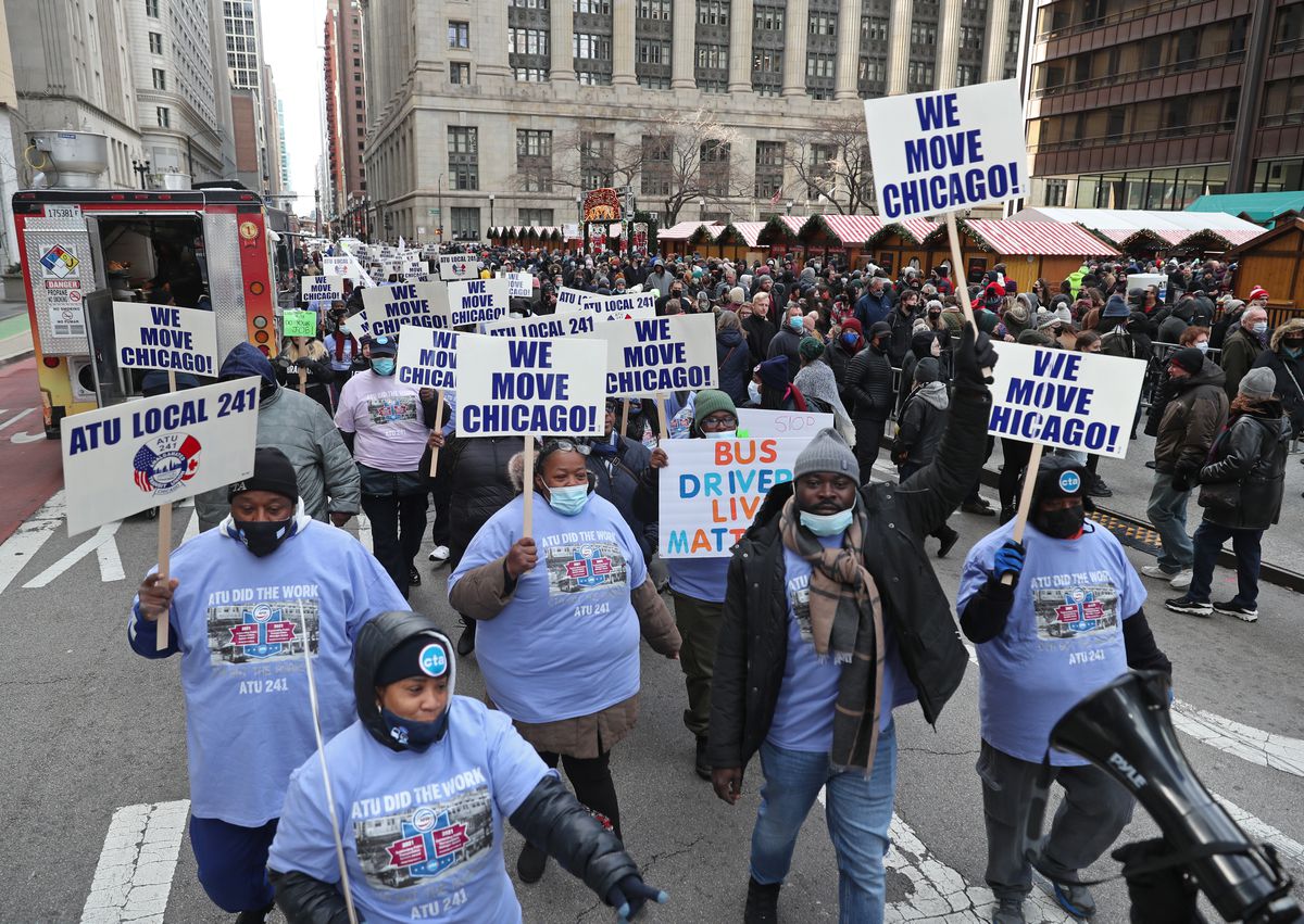 More than 100 members and supporters of CTA unions briefly
block Michigan Avenue to protest attacks against operators 1 More than 100 members and supporters of CTA unions briefly
block Michigan Avenue to protest attacks against operators 1