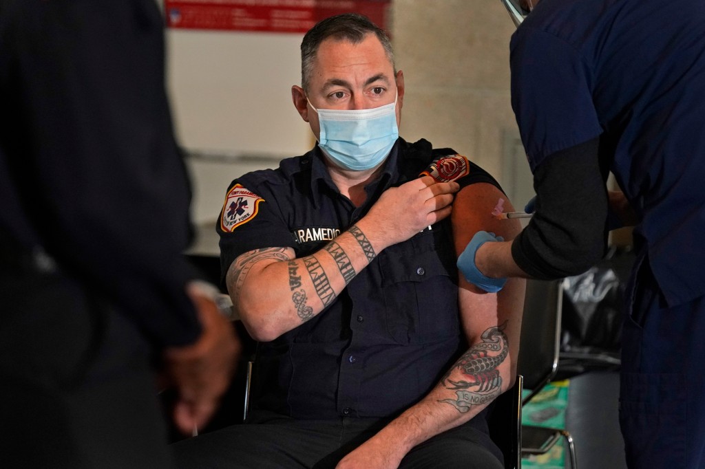 NYC correction officers union sues city over vaccine
mandate 1