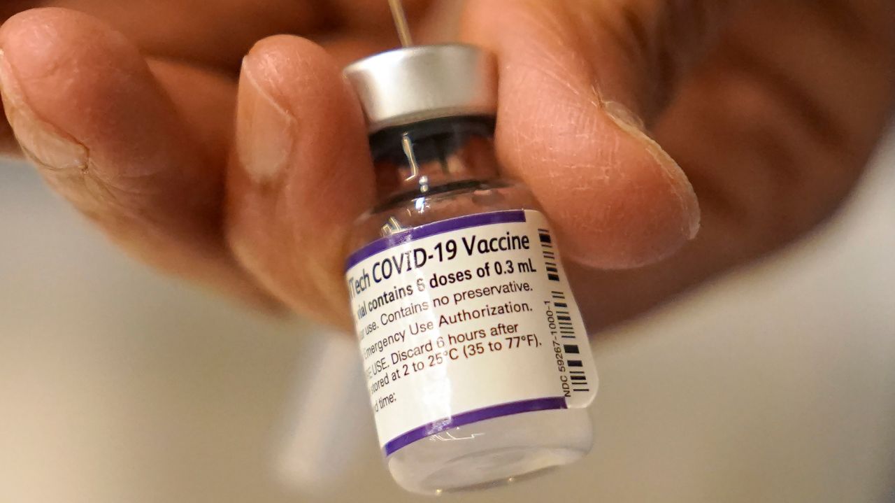 FDA expands Pfizer COVID booster, opens extra dose to age
16 1