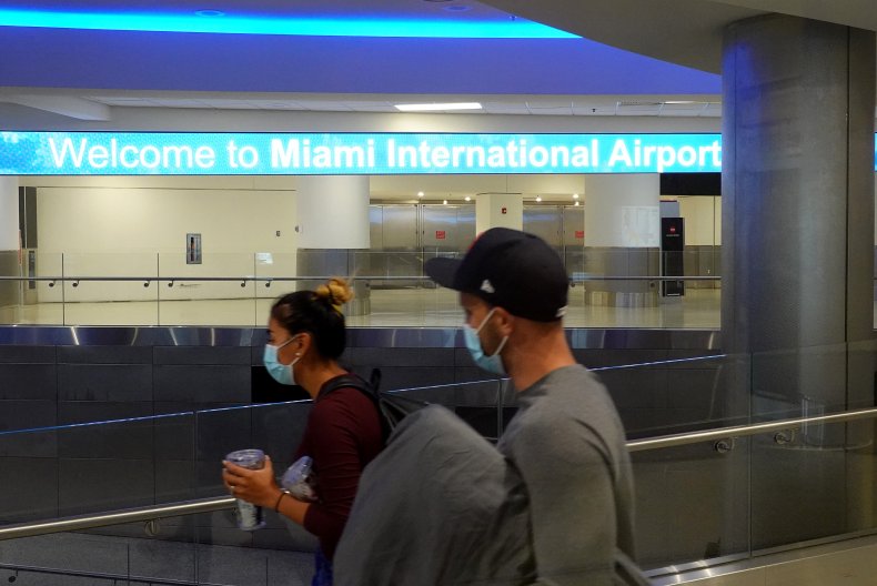 2 Charged After Starting Brawl In Miami Airport Which Led to
Officer Being Bitten on Head 1